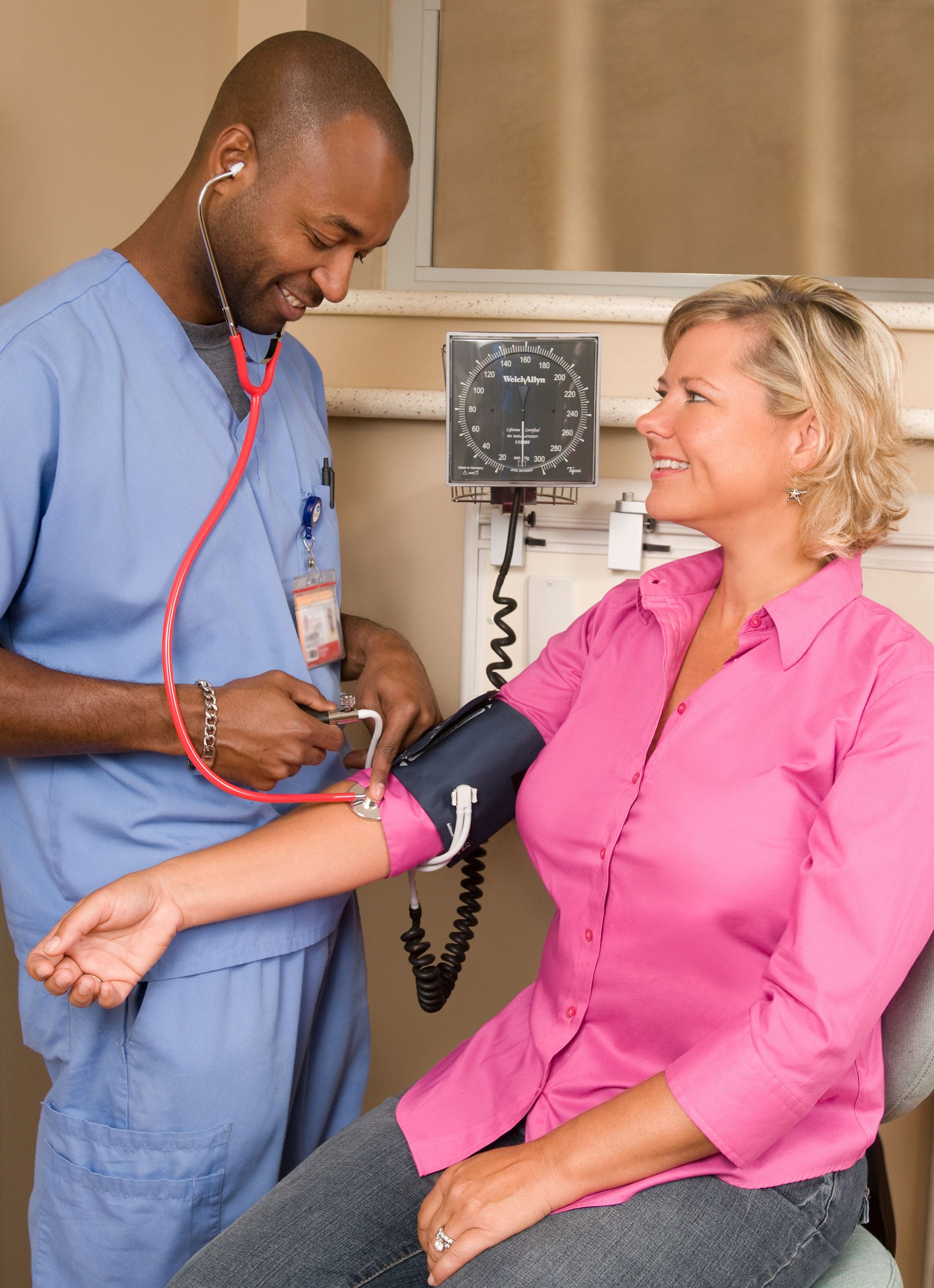 lady having her blood pressure taken